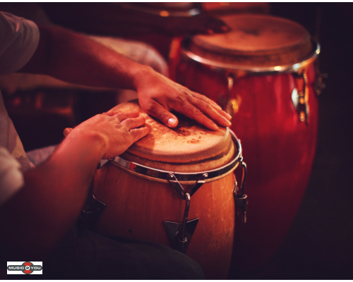 Hvad er en conga? En guide til det rytmiske hjerte i percussionverdenen